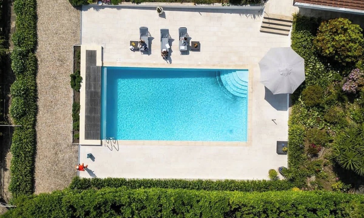 Paredes House | Classic Villa w/Gym & Pool Access by HostWise