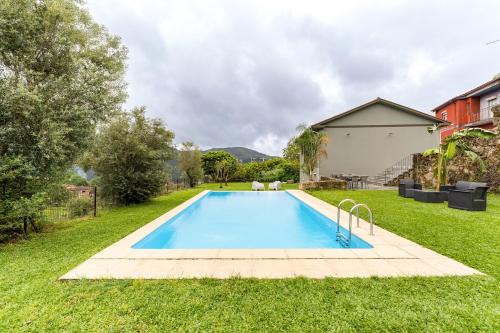 Amares House | Modern retreat with pool and garden