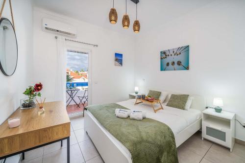 Areias de Sao Joao Apartment | Sunlit Balcony & Open Space Flat by HostWise