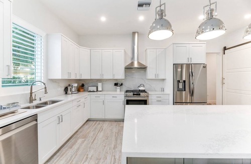 West Bay Condo | 7 Mile Luxury Beach Club. Ocean views from Roof Terrace and Pool Pavilion.