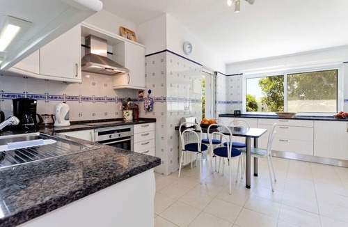 Carvoeiro House | A Caribbean vibe on the picturesque rocky Algarve coast, housekeeping service, heated saltwater pool