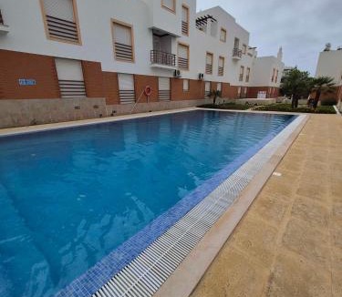 Conceicao e Cabanas de Tavira Apartment | Bright Flat w/Terrace & Pools by HostWise