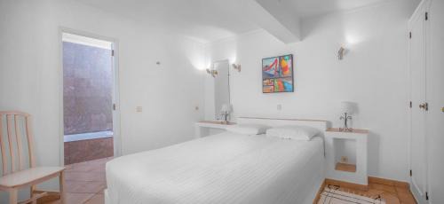 Praia da Luz Apartment | Charming Apartment with Garden Views in Luz