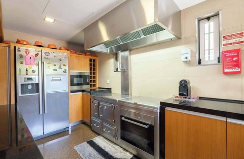 Paredes House | Classic Villa w/Gym & Pool Access by HostWise