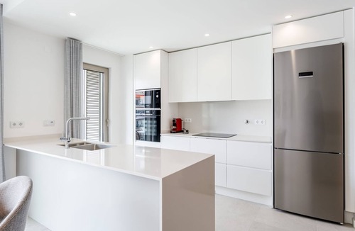 Lagos Apartment | Modern 2BR w/Rooftop Pool & Parking by LovelyStay