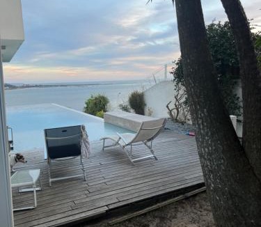 Linda-a-Velha Villa | Modern Villa with Sea & River View Pool and Gym.