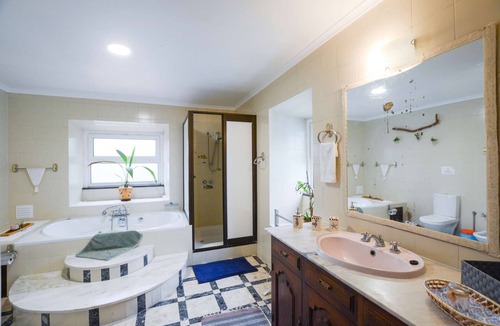 Ribeira Grande Cabin | Pool suite with marble bath in exotic fruit orchard