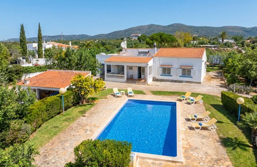 Olhao Villa | Relax with sunrise, sunset, and countryside scenery from your private terrace.