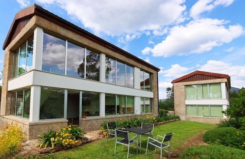 Molares Villa | Serene Mountain View & Modern Comfort Stay | Free Parking + Infinity Pool