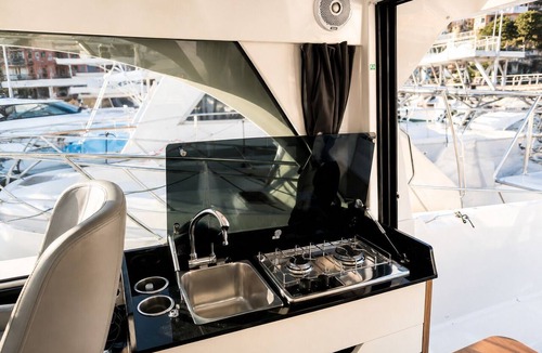 La Condamine Boat Rental | This boat accommodation features two separate bedrooms, a fully equipped kitchenette with a refrigerator and stovetop, and one bathroom. Towels and bed linen are provided for your stay.