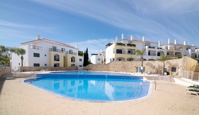 Apartment 'O'Pomar 150' with Shared Pool, Balcony, and Air Conditioning