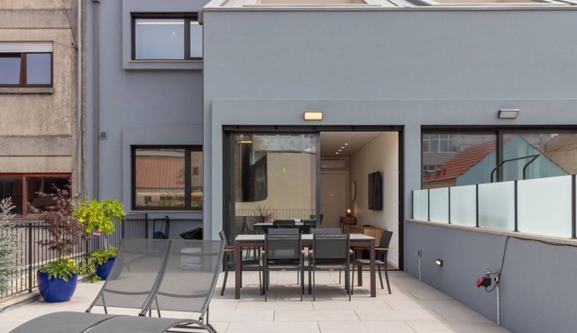 Coastal 3BR Duplex w/Terrace by LovelyStay