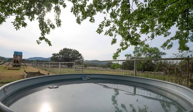 Relax with Hill Country Views! Stock tank POOL and great backyard! in Utopia
