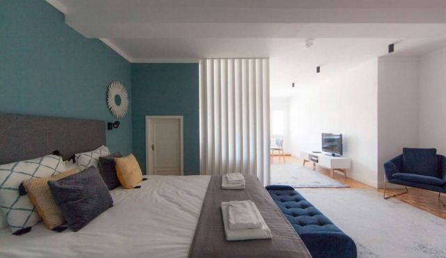 Studio with a double bed, sofa bed and air conditioning.