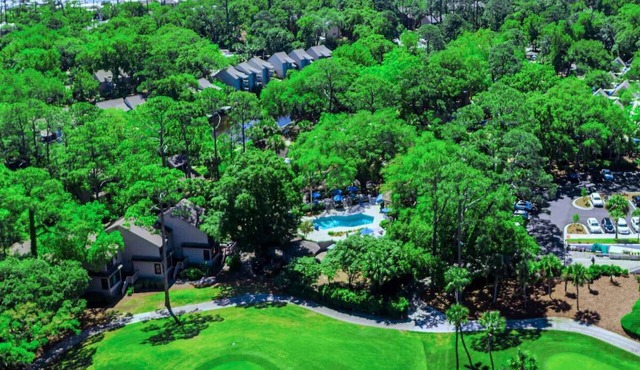Walk to Beach | Pool, Free Parking + Full Kitchen in Hilton Head