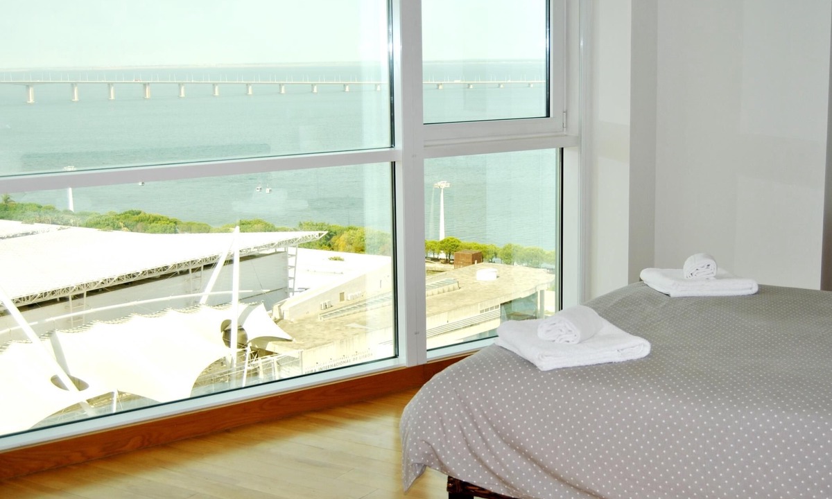 Parque das Nacoes Apartment | High Floor Apartment in Tower with Panoramic Balcony Over Rio EXPO09